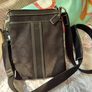 Coach Black over-the-shoulder Signature C’s